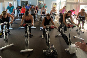 spin class in a modern gym near me