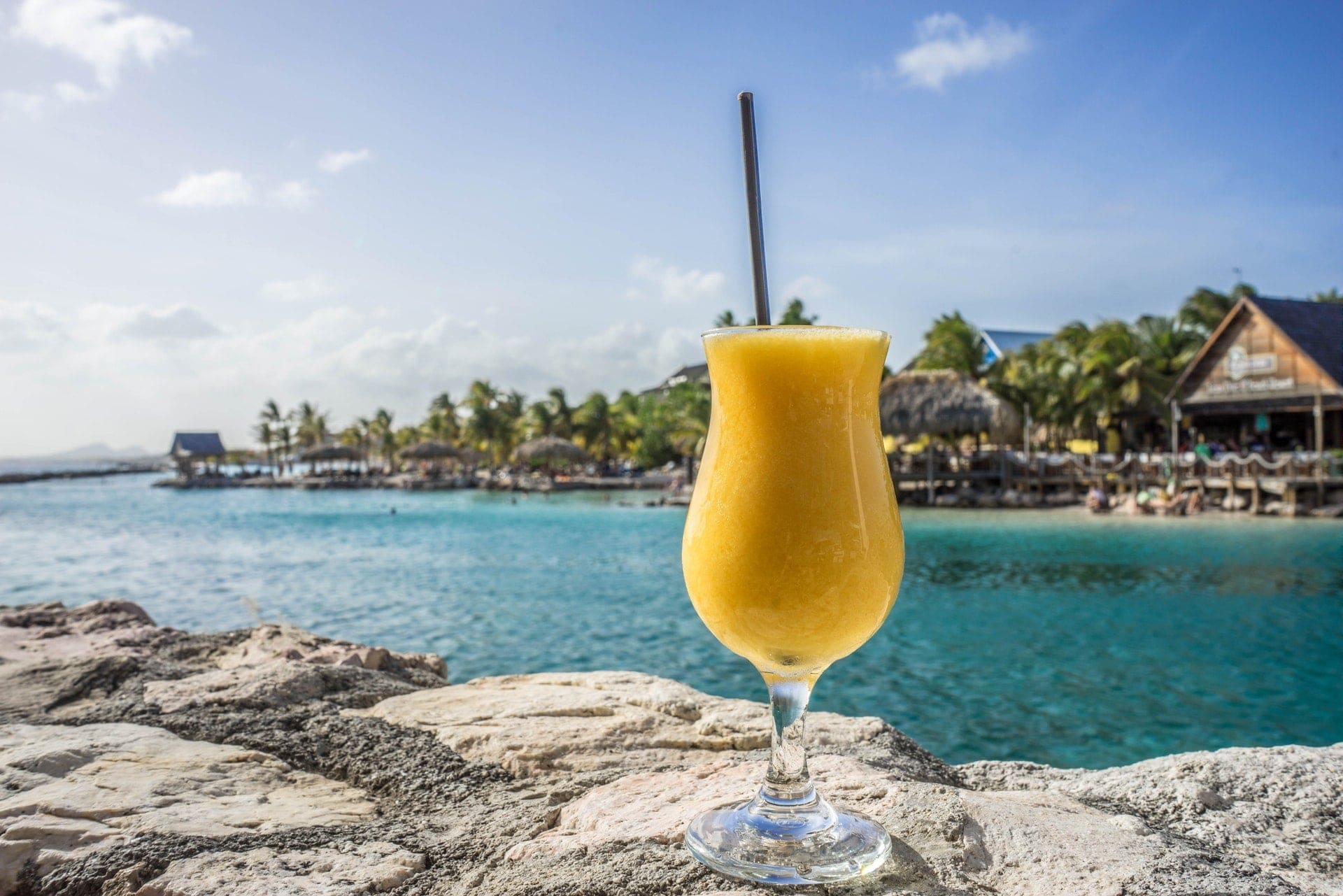 fresh fruit cocktail on beach for healthy weight loss