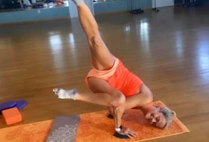 gym member doing a yoga pose